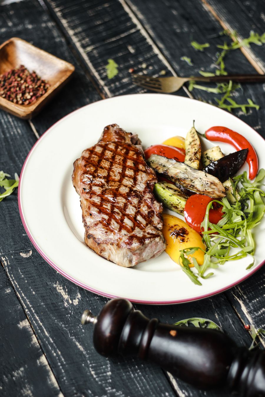 Grilled sirloin with vegetables on a plate